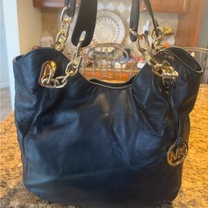 Michael Kors Black Leather Shoulder Bag with Gold Accents